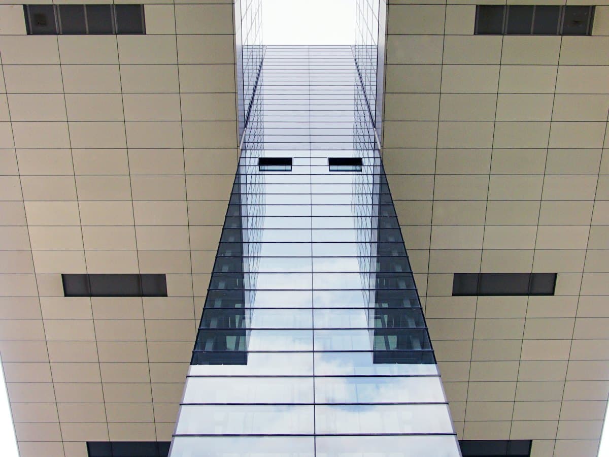 Daylit glass atrium at the center of a commercial building