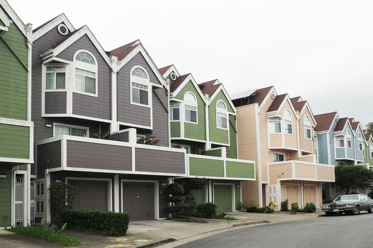 Row of newly built townhouses along a suburban street
